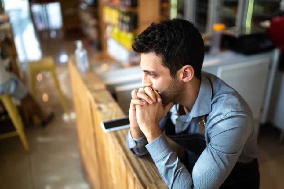 Pensive male business owner